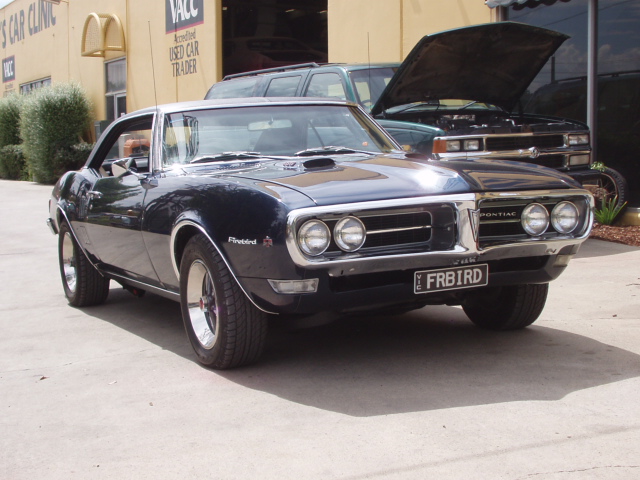Classic Pontiac Firebird outside Crammond's Car Clinic