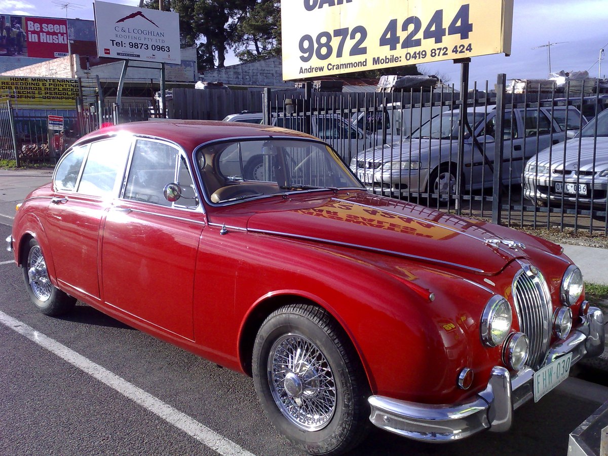 Red Jaguar Mark 2 parked at Bayswater Car Sales