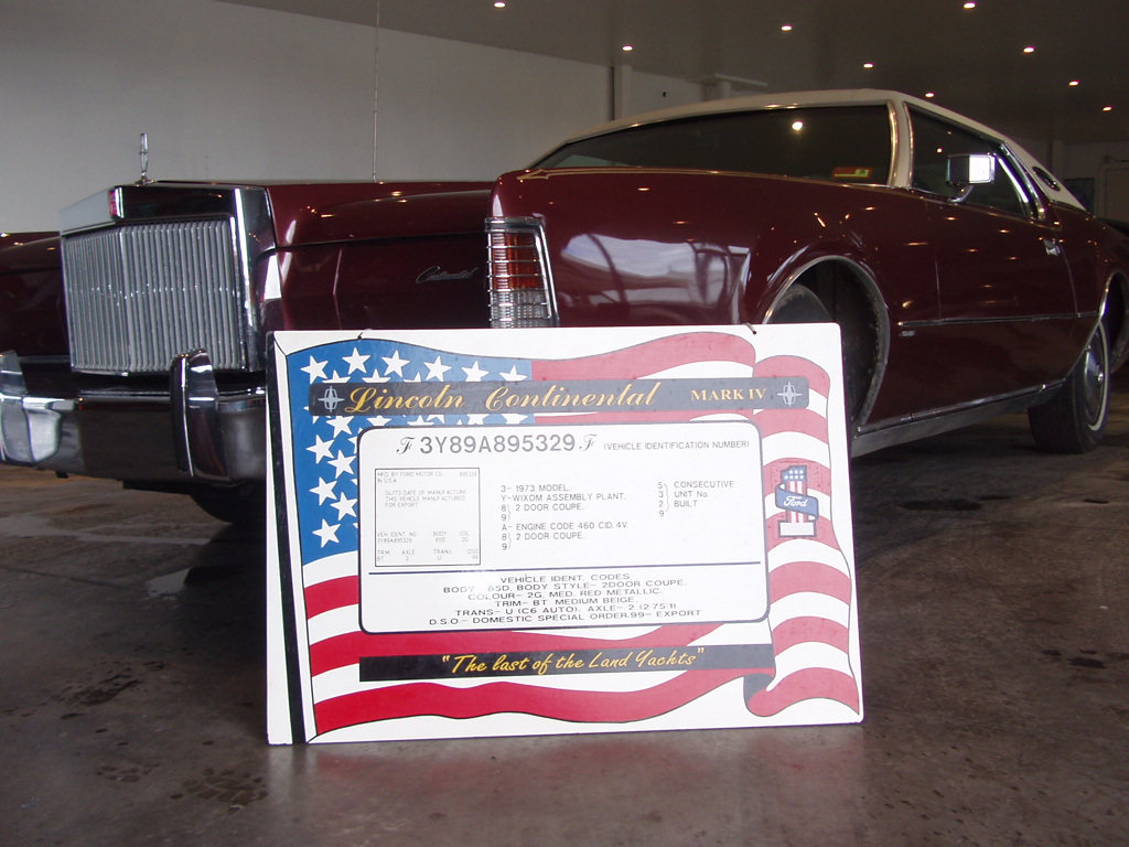 Lincoln Continental Mark IV with its identification plate on display