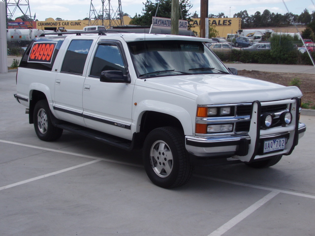 A vehicle for sale outside the Bayswater Car Sales and Crammond's Car Clinic premises