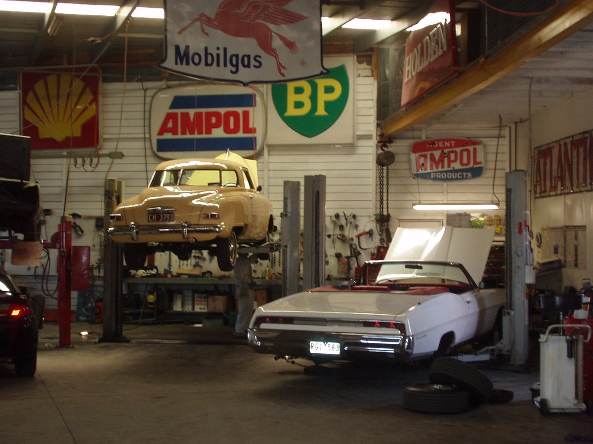 Workshop with vintage Shell, BP, Ampol, Mobilgas and Holden signage